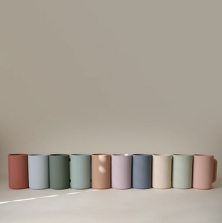 Mushie silicone Bath Rinse Cup in assorted colors