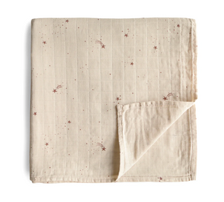 Mushie Organic Cotton Muslin Swaddle Blanket in assorted patterns
