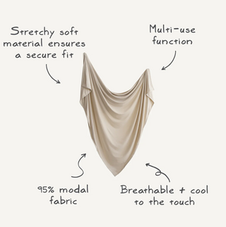 Mushie Stretchy Swaddle in dried thyme and natural