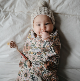 Mushie Organic Cotton Muslin Swaddle Blanket in assorted patterns