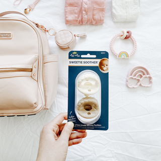 Itzy Ritzy - *NEW SIZE* Sweetie Soother™ Pacifier Sets (2-pack): Toast + Buttercream Braids