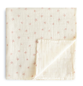 Mushie Organic Cotton Muslin Swaddle Blanket in assorted patterns