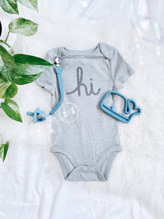 Itzy Ritzy - *NEW SIZE* Sweetie Soother™ Pacifier Sets (2-pack): Toast + Buttercream Braids