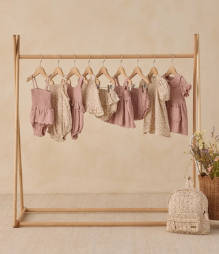QUINCY MAE SMOCKED SKIRTED ROMPER MAUVE